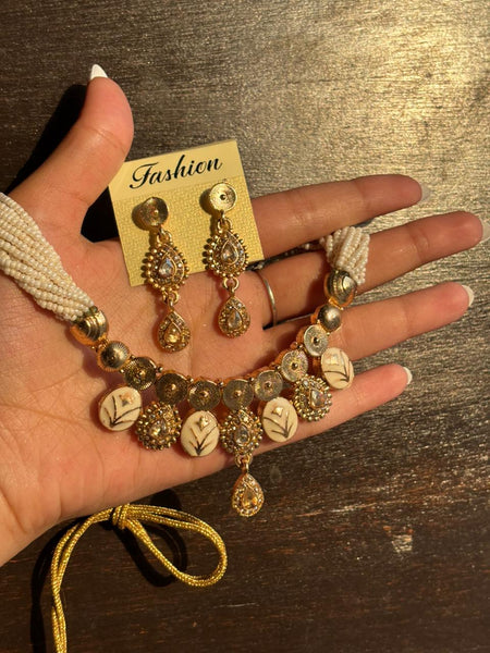 Rajputi Ivory Floral Kundan Necklace & Earrings Set